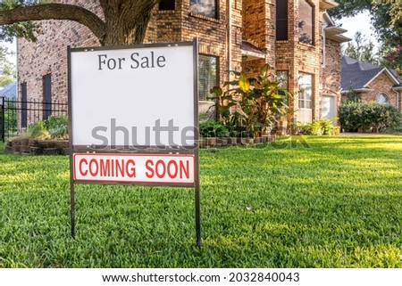 For Sale sign, coming soon in front of a single family home