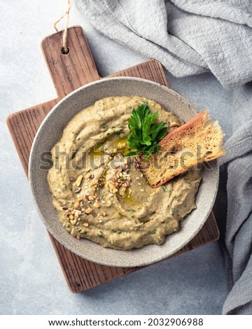 Baba ghanoush, baba ganoush or eggplant hummus, traditional Middle Eastern cuisine, top view Royalty-Free Stock Photo #2032906988