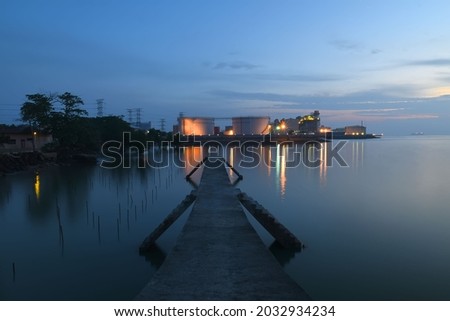 SUNSET VIEW AT A FISHING JETTY IN PORT DICKSON, MALAYSIA Stock 