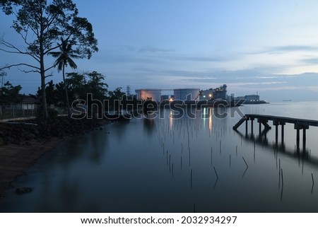 SUNSET VIEW AT A FISHING JETTY IN PORT DICKSON, MALAYSIA Stock 