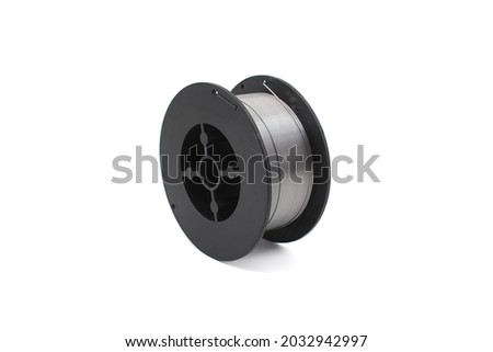 Flux cored welding wire for gasless welding isolated on white background Royalty-Free Stock Photo #2032942997