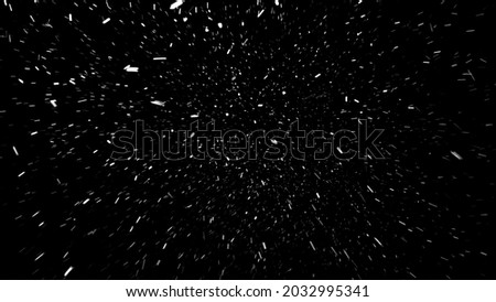 Heavy snow falling from the sky on the black background, seamlessly looped. Big snowflakes are blown by the strong wind in different directions.