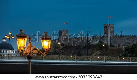 evening city castle Skopje in Macedonia in the evening and street lamp. Selective focus