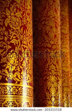 the detail of  thai style gold painting on temple pillars for decoration,shallow focus,Chiang Rai temple,Thailand