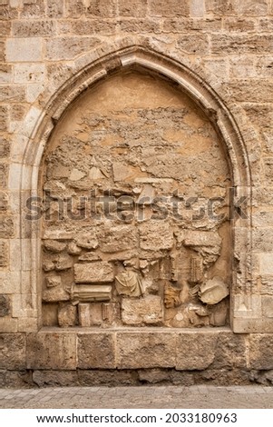Medieval stone arch false fake window. Frame background, copy space. 