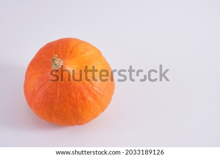 orange pumpkin on gray background copy space top view autumn, autumn season concept
