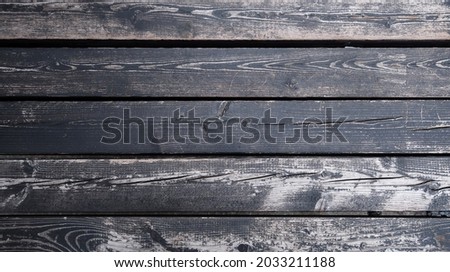 Old black wooden background. Timber board texture. Grunge wallpaper              