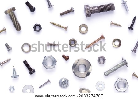 Set of old metal screw, bolt head, nut, washer and nail tool isolated on white background Royalty-Free Stock Photo #2033274707