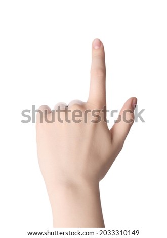 Woman pointing at something against white background, closeup