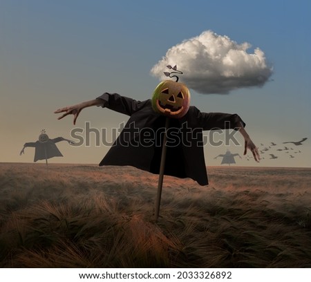 Contemporary collage of creepy poster of pumpking scarecrow standing in terrifying field on daytime. Scary human hands appearing from suit. Ravens in sky. Concept of Halloween, pumpkin head, fear, ad