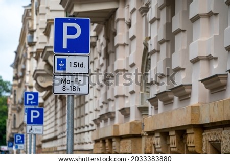 Typical German accumulation of traffic signs with various parking instructions