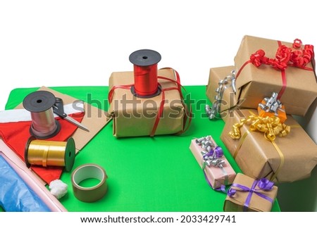 Сlose-up view of gifts packed in holiday boxes lying on the desktop. Christmas holiday concept. Postcard. Sweden. 