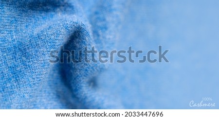 Light blue luxury pure cashmere texture. Blurred background banner  with copy space