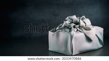 Gift wrapped in Korean traditional cloth Royalty-Free Stock Photo #2033470886