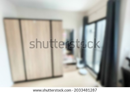 blurred background of a vintage decoration living room with a retro closet, furniture, Chroma key video backdrop.