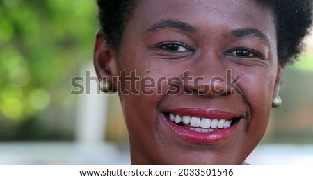 African woman smiling portrait close-up face