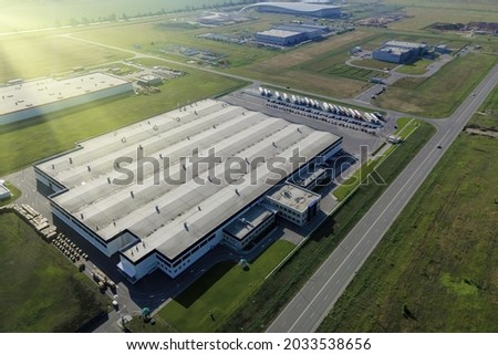 Industrial zone and technology park and logistics center with warehouse, loading hub. Industry from above, aerial shot
