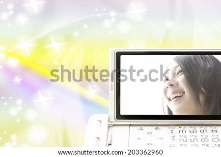 Woman Smiling Reflected In Mobile Screen