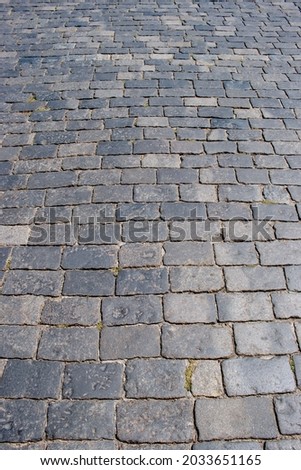 Texture: close-up of gray stone path. Travel photo. 