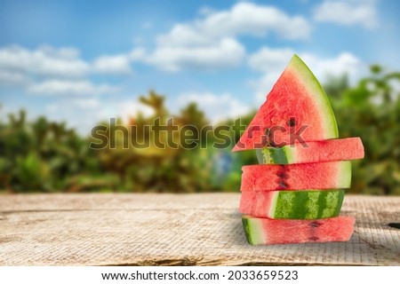 Watermelon fresh ripe sweet slices on the desk