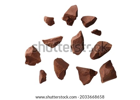 piece of chocolate explosion  isolated  on white background  with clipping path. Full depth of field. Royalty-Free Stock Photo #2033668658