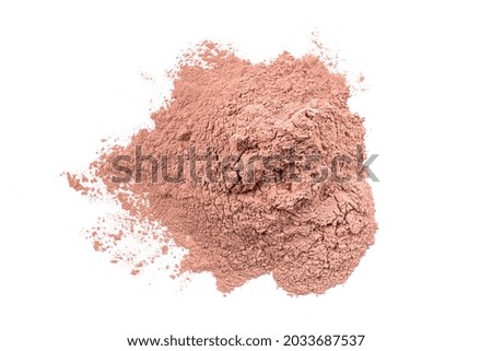 Dry red cosmetic clay isolated on white background. Heap of pink cosmetic clay. Royalty-Free Stock Photo #2033687537