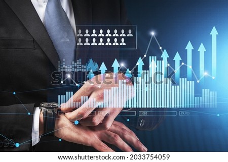 Businessman wearing formal suit is checking time on his watches. Icons of human resources, financial graph and bar diagrams in the foreground. Concept of trading and management