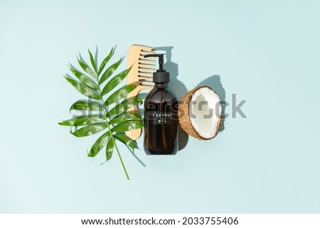 Natural cosmetics, coconut oil hair treatments concept, view from above, flat lay Royalty-Free Stock Photo #2033755406
