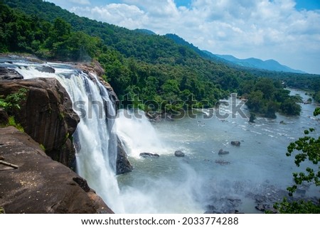 Athirapally waterfalls Kerala India, Beautiful waterfall Landscape photography Athirapally Kerala India, beautiful waterfall in rainforest
