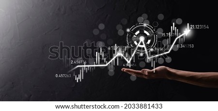 Hand hold sales data and economic growth graph chart. Business planning and strategy. Analysing trading of exchange. Financial and banking. Technology digital marketing.Profit and growing plan