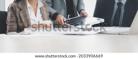 Solar panel green or renewable energy business concept, Closeup Group of business people meeting on solar cell panel technology and planning together Royalty-Free Stock Photo #2033906669