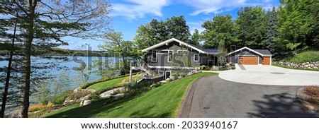 A newly remodeled home in Northern Michigan, at Walloon Lake. Royalty-Free Stock Photo #2033940167