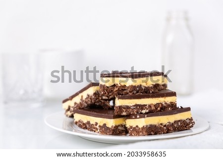 A small plate of Nanaimo bars - a traditional Canadian dessert Royalty-Free Stock Photo #2033958635