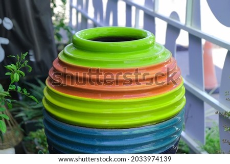 colorful pottery for decorating a small garden