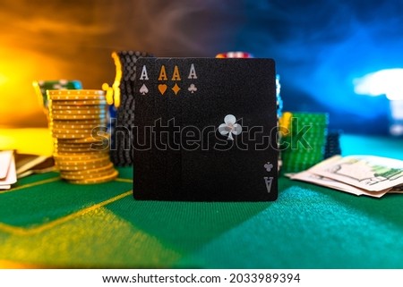 Four aces. Poker. Casino, night club. Caret. Strong position in poker. Gambling, risk, gambling addiction, sports poker, game strategy. There are no people in the photo. There is a place to insert. Royalty-Free Stock Photo #2033989394