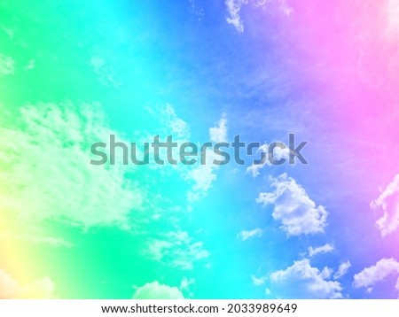 beauty sweet pastel soft green and yellow with fluffy clouds on sky. multi color rainbow image. abstract fantasy growing light
