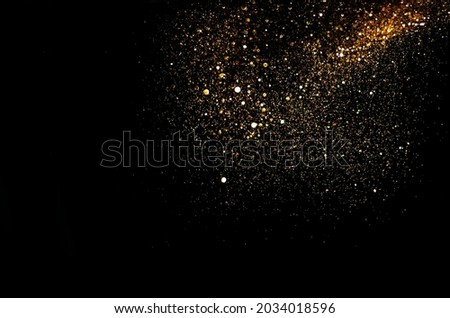 glitter vintage lights background. gold and black. de focused	 Royalty-Free Stock Photo #2034018596