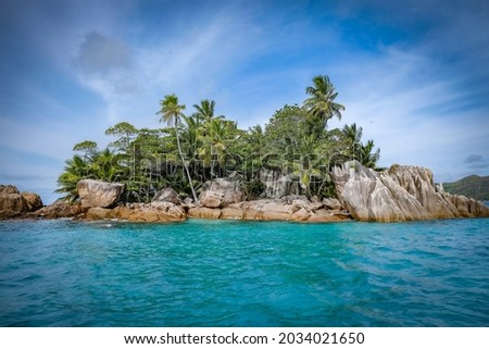 A small island in seychelles Royalty-Free Stock Photo #2034021650