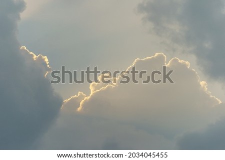 Blue and white colors of the sunset over Moscow city in hot summer.  Before the rain. Harbinger of the storm, Suitable as backgrounds, backdrops. Concepts of the beauty in nature. Storm is coming Royalty-Free Stock Photo #2034045455