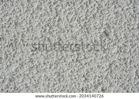 gray wall texture. plaster orange peel on the wall