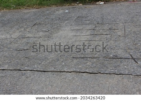 Roads that have been in use for a long time are often cracked and need to be patched.