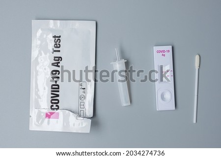 Rapid Antigen Test kit with Negative result during swab COVID-19 testing. Coronavirus Self nasal or Home test, Lockdown and Home Isolation concept Royalty-Free Stock Photo #2034274736