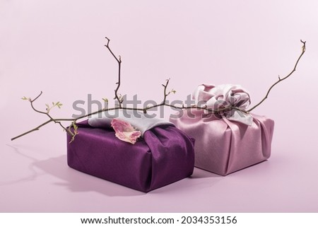 Korean traditional wrapping cloth on the color background. wrapping cloth gift packaging Royalty-Free Stock Photo #2034353156