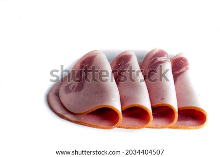 Sliced smoked tasty ham isolated on white background,