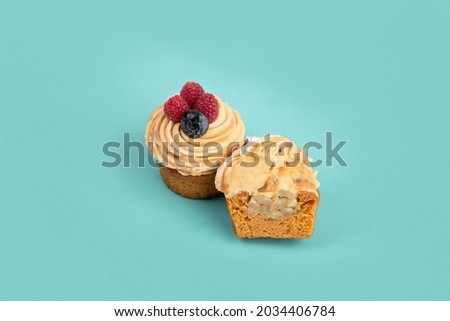 Delicious desserts cakes with berries on a blue background