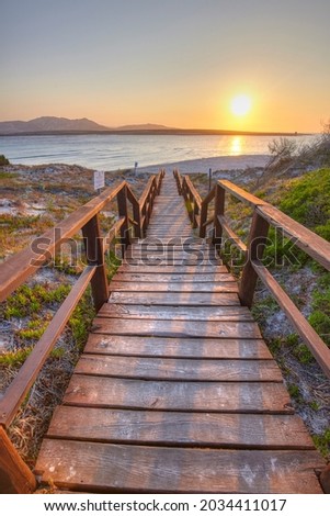 Footbridge to the beach of La Pelosa in Stintino, Sardinia, Italy Royalty-Free Stock Photo #2034411017