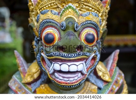 Closeup of traditional Balinese God statue in Central Bali temple