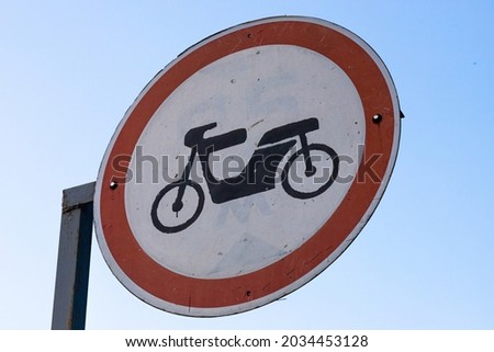 Dutch road sign: no access for mopeds, motor-assisted bicycles or motor-powered invalid carriages