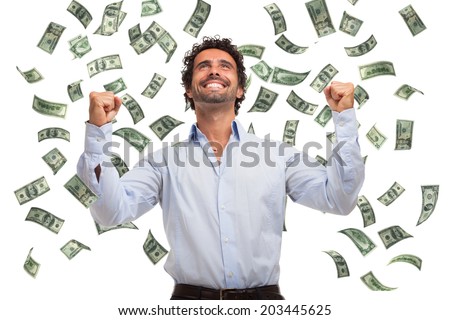 Happy man enjoying a rain of money