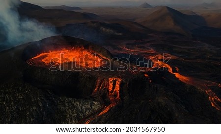 Impressive aerial View of the active volcano explosions of lava and magma rivers in Iceland